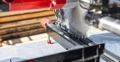 Close-up of a wooden frame for a new construction project. The frame rests on a concrete foundation. Construction of a wooden frame house. photo