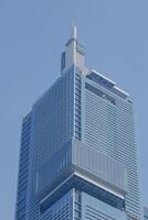Tall building with blue sky background photo
