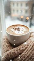 Christmas winter mug of coffee with a leaf milk on top sits on a wooden tray near window. Cozy Scandinavian Vertical stories photo