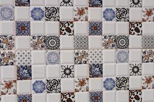 Decorative ceramic tiles arranged in a colorful mosaic pattern in a bright space photo