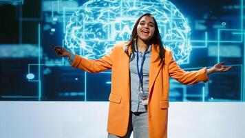Speaker talking with world leading technology experts and innovators meeting at event to do deep dive into artificial intelligence technology. Expert showcasing latest innovations in AI, camera A photo