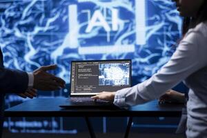 Computer scientist running AI cognitive computing tech on laptop to simulate computerized model. Close up of notebook used by IT specialist in workspace to do data mining with self learning algorithms photo