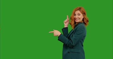 Woman points with both index fingers forward. video