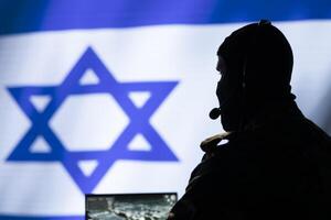 Israel intelligence agency operator uses program deploying bots on social networks, smearing political opponents. Israeli Mossad agent engages in cognitive warfare using troll accounts photo