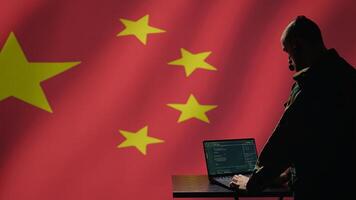 Chinese operative develops program able to deploy bots on social networks, smearing political opponents. CCP agent engages in cognitive warfare using software enabling troll accounts, camera B photo
