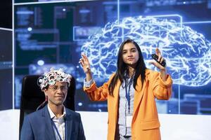 Portrait of specialist speaking at tech event, explaining impact of neural implants and AI technology. Neuroscience researchers present risks and threats associated with conscience transferring photo