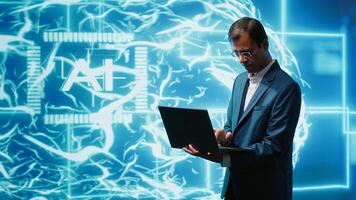 Computer scientist using laptop to implement artificial intelligence parallel processing, breaking up complex computational tasks enabling AI systems to process more input data faster, camera A photo
