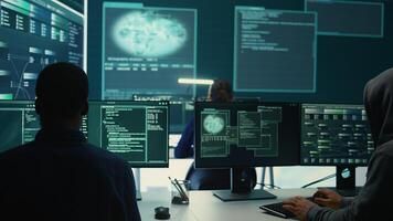 Governmental agency team conducting cyber security monitoring and threat detection tactics. IT experts work on cybercrime prevention, network security and information protection. Camera B. photo