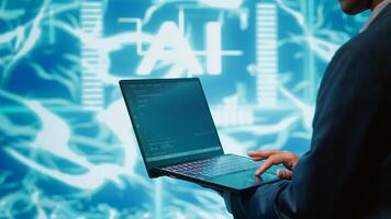 System administrator solving tasks on laptop, running artificial intelligence programming scripts. Close up shot of technician manipulating lines of code for AI applications development, camera A photo