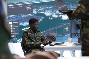 High tech military office with soldiers analyzing real time data, processing intelligence information and coordinating strategic operations to ensure national security. Working for army missions. photo