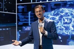 Smiling company executive presenting how AI technologies can bring businesses increased productivity during conference. Happy man using mic to discuss about implementation of AI driven solutions photo