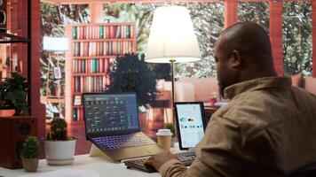 AI software engineer coding modern innovative development project on his gadgets, showcasing machine learning and data processing on neural network. Artificial intelligence business. Camera B. photo