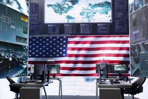 Empty military control center with a big screen shows the American flag, secret service agency protecting the country from threats. Army command room with high tech equipment. photo