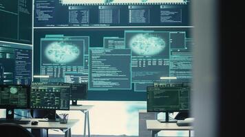 Advanced cyber surveillance room with no personnel present. Governmental agency ensuring national security through cyber security monitoring, data protection and malware detection. Camera B. photo
