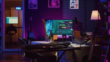 Empty home studio filled with recording and mixing instruments, electronic devices and daw software used for music production and acoustics. Modern bright space with soundboard panel. Camera A. photo