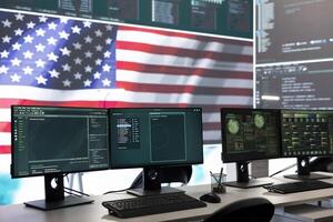 Empty governmental surveillance room shows an American flag, cybersecurity and data protection. High tech operations center focusing on threat and malware detection, security protocols. photo
