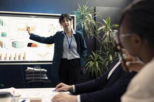 Business manager trying to eliminate risks of unforeseen events and disruptions, discussing supply chain resilience and contingency plans. Supervisor and staff members achieving progress. photo