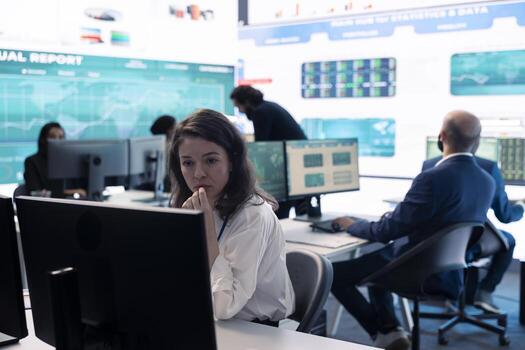 Project manager examining key performance metrics to ensure global business success, working with annual infographics to understand what needs improving. Multinational company activities. photo