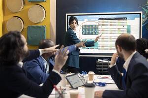 Team members assembling in a meeting to debate latest events and updates on organization situation. Manager and employees receive instruction to build an international corporation. photo