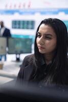 Business analyst does a presentation with project updates on pc, ensuring organizational success. Employee allocating resources according to the market needs for growth in office. photo