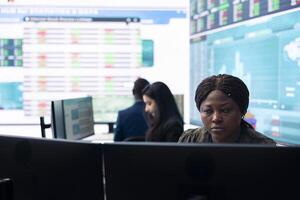 Financial manager implementing new ideas to increase business profit, evaluating market trends to create a strategy for global expansion. Accounting specialist explores possibilities. photo