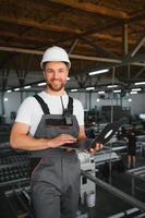 Male worker at a factory photo