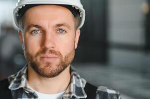 portrait of a confident worker in a factory photo