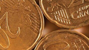 20 Euro Cent Coins, Rotating Money Background - Top View, Macro. Euro Money Currency. A Lot of Twenty Cent Cash. Golden Eurocents. Business, Finances and Money Saving Concept - Slow Rotation Left video