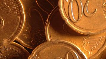 Scattered 20 Euro Cent Coins, Rotating Money Background - Top View, Macro. Euro Money Currency. A Lot of Twenty Cent Cash. Business, Finances and Money Saving Concept - Slow Rotation Right video