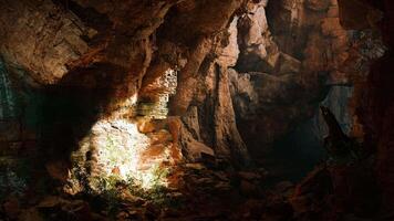 A mysterious cave illuminated by a beam of light video