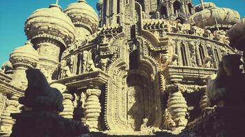 A towering building adorned with an intricate clock on its side video