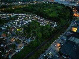 Aerial View of Illuminated Southampton Docks and Port City Centre During Dark Night. England United Kingdom. High Angle Drone's Camera Footage Captured from High Altitude on May 16th, 2024 photo