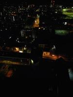 Aerial View of Illuminated Southampton Docks and Port City Centre During Dark Night. England United Kingdom. High Angle Drone's Camera Footage Captured from High Altitude on May 16th, 2024 photo