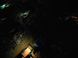 Aerial View of Illuminated Southampton Docks and Port City Centre During Dark Night. England United Kingdom. High Angle Drone's Camera Footage Captured from High Altitude on May 16th, 2024 photo