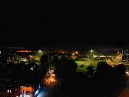 Aerial View of Illuminated Historical Central Coventry City Centre Downtown of England United Kingdom. Night view Captured on After Midnight with Drone's Camera on October 23rd, 2024 photo