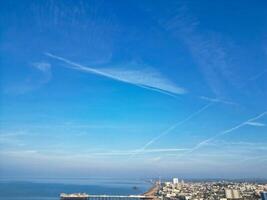 Most Beautiful Aerial View of British Beach and Ocean at Brighton and Hove City of England United Kingdom. High angle Most Wanted British Tourist Attraction Was Captured on May 9th, 2024 photo