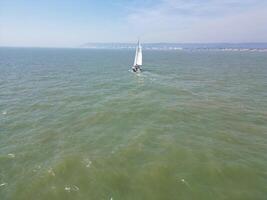 High Angle View of Most Beautiful British Tourist Attraction Sea Front and Ocean of Eastbourne Ocean City of England UK. Aerial Footage Was Captured with Drone's Camera on May 11th, 2024 photo