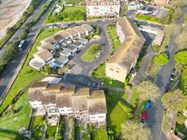 High Angle View of Historical Central Eastbourne Buildings and City of England, United Kingdom. Aerial Footage Was Captured with Drone's Camera During Windy Day on May 11th, 2024 photo