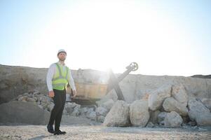 Quarry worker doing a quality check photo