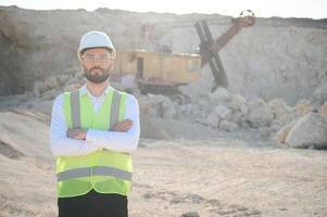 Quarry worker doing a quality check photo