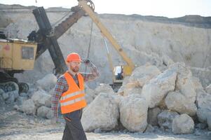 Quarry worker doing a quality check photo