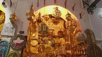 Golden objects trade handmade by local tunisian craftsmen in copper. video