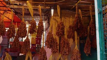 Market counter with various assorted dried plants in Tunnis. video