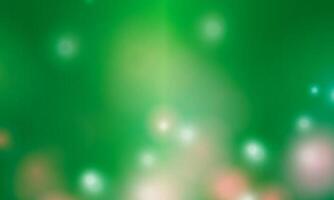 Blurred bokeh light on green background. Abstract glitter defocused. vector
