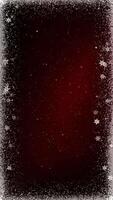 Vertical Snow Frame Christmas Dark Red 4K Loop features a dark red background with white particles and snowflakes emanating from the edges to make a frame in a vertical ratio loop. video