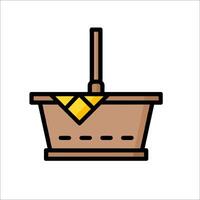 A basket with a yellow cloth on it vector