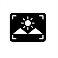 A camera with a sun and mountains on it vector