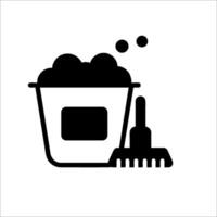 A black and white icon of a bucket and a broom vector