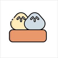 Two dumplings are sitting on top of a box vector