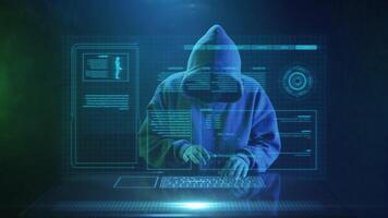 cybercriminal hacker in a mask enters text on the keyboard and rejoices video